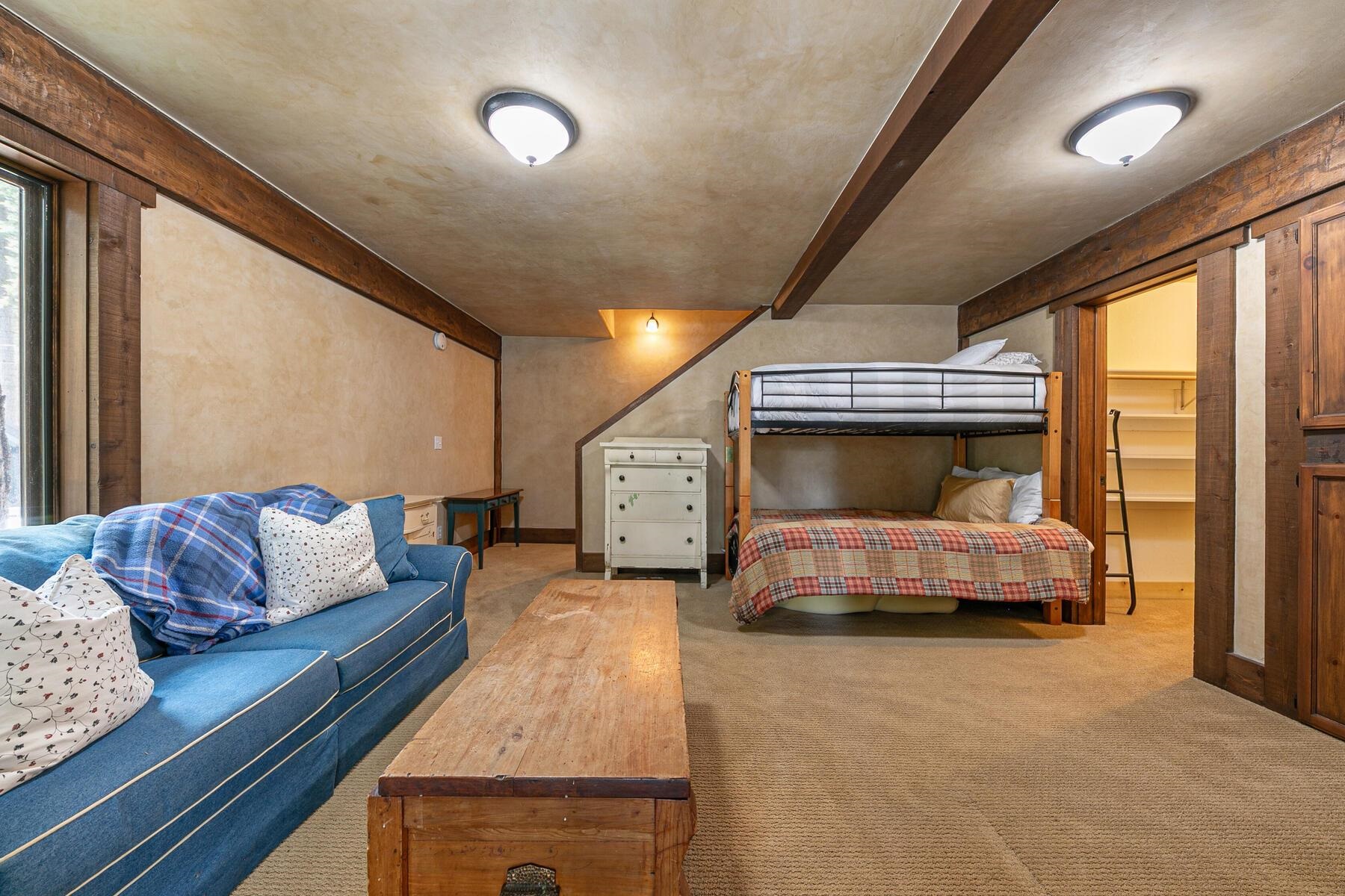 12209 Greenleaf Way Truckee, CA 96161 - Photo 21 of 28 a living room with furniture and a large window