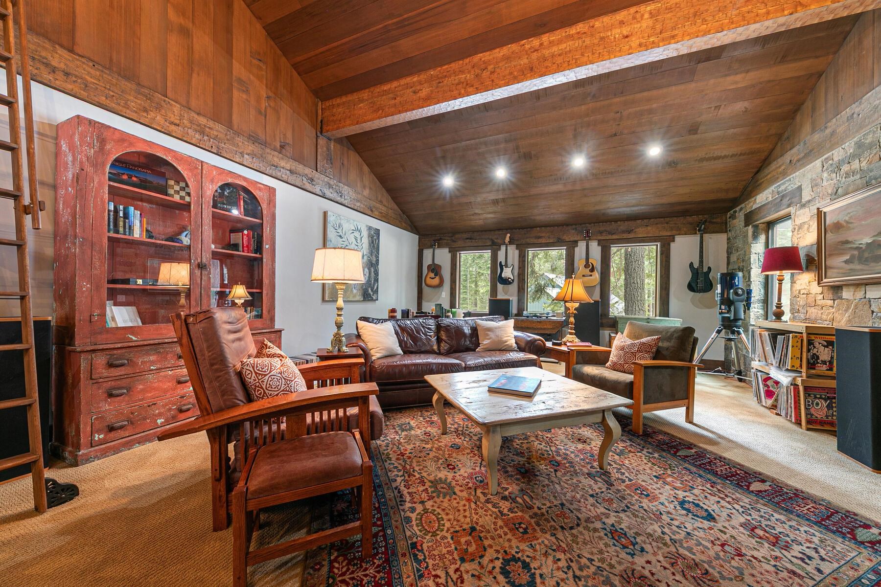 12209 Greenleaf Way Truckee, CA 96161 - Photo 7 of 28 a living room with furniture and a book shelf