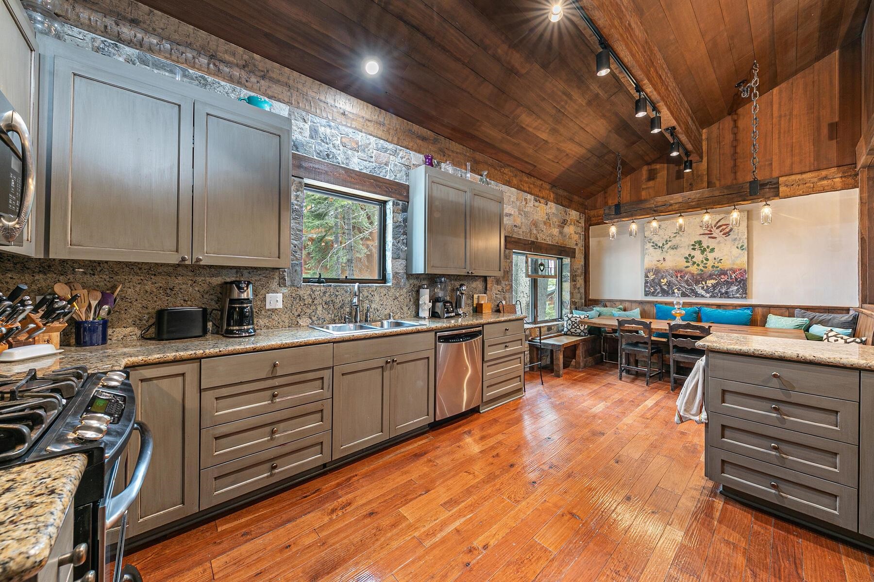 12209 Greenleaf Way Truckee, CA 96161 - Photo 10 of 28 a kitchen with lots of counter top space and a view of living room