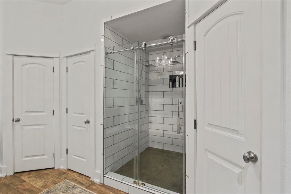 125 George Owens Road Ponder, TX 76259 - Photo 16 of 37 a bathroom with a shower