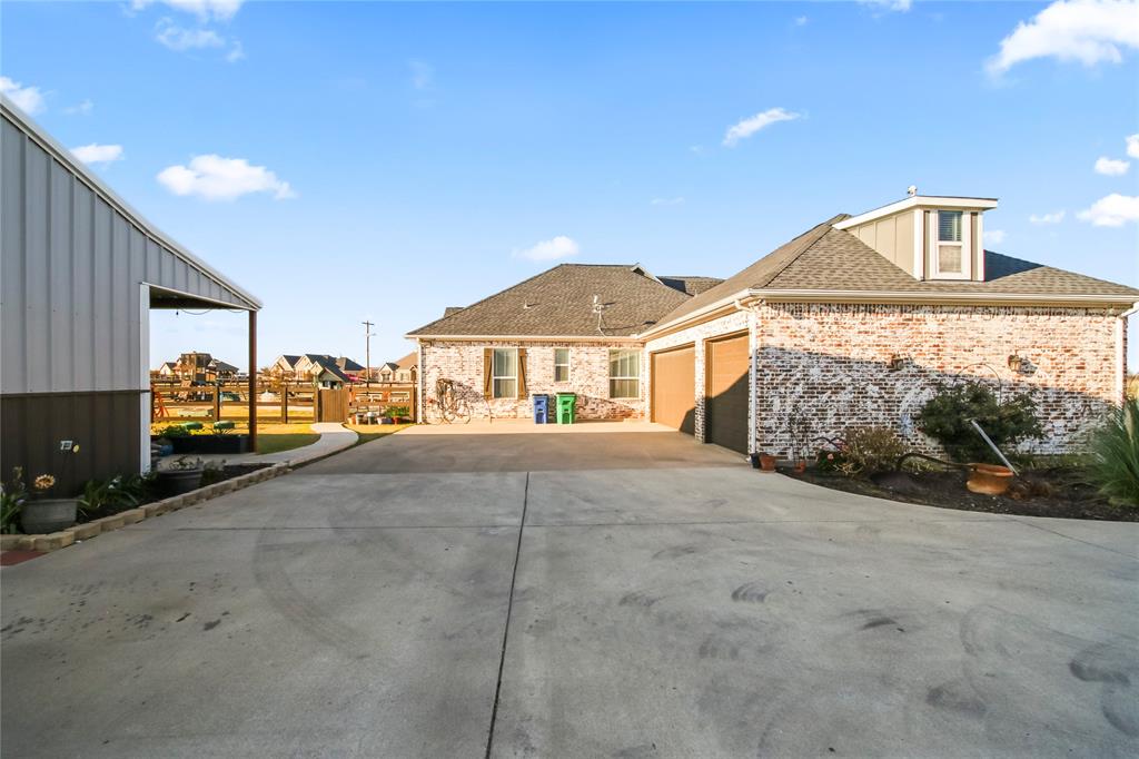 125 George Owens Road Ponder, TX 76259 - Photo 27 of 37 a view of house with outdoor space and porch