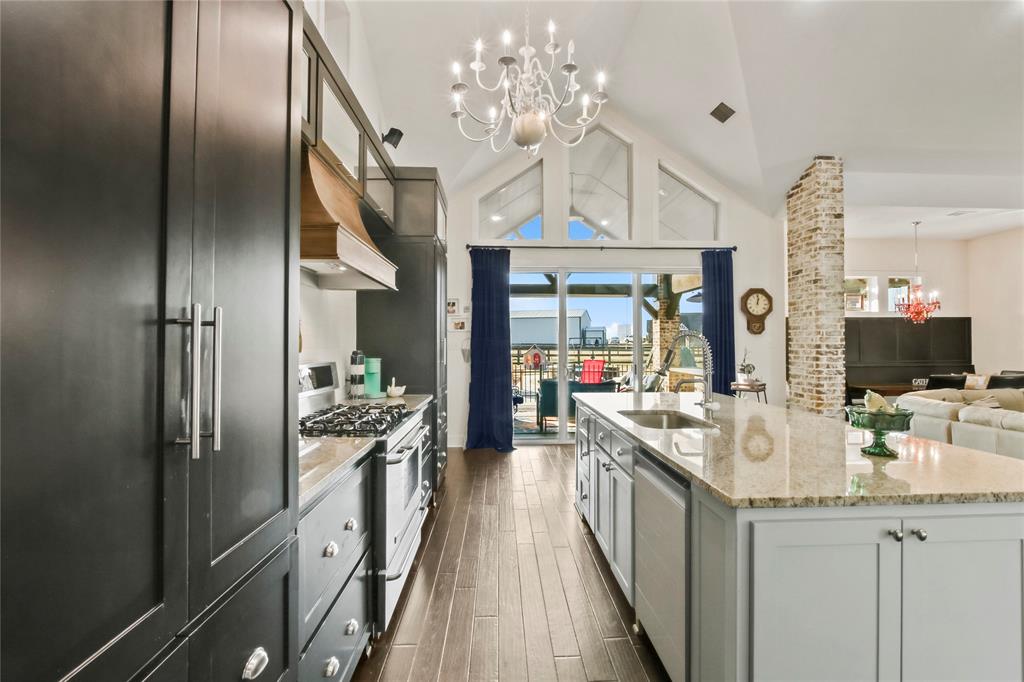 125 George Owens Road Ponder, TX 76259 - Photo 3 of 37 a kitchen with stainless steel appliances a refrigerator and a sink