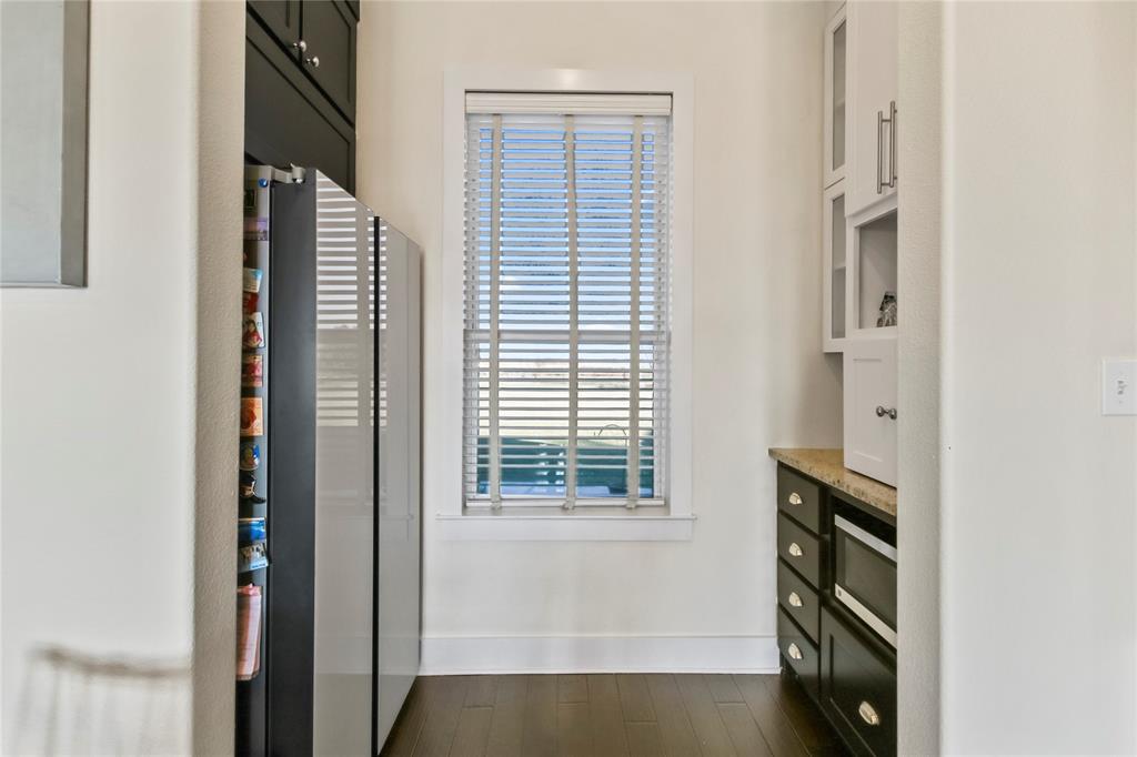 125 George Owens Road Ponder, TX 76259 - Photo 5 of 37 a bathroom with a bathtub and a window