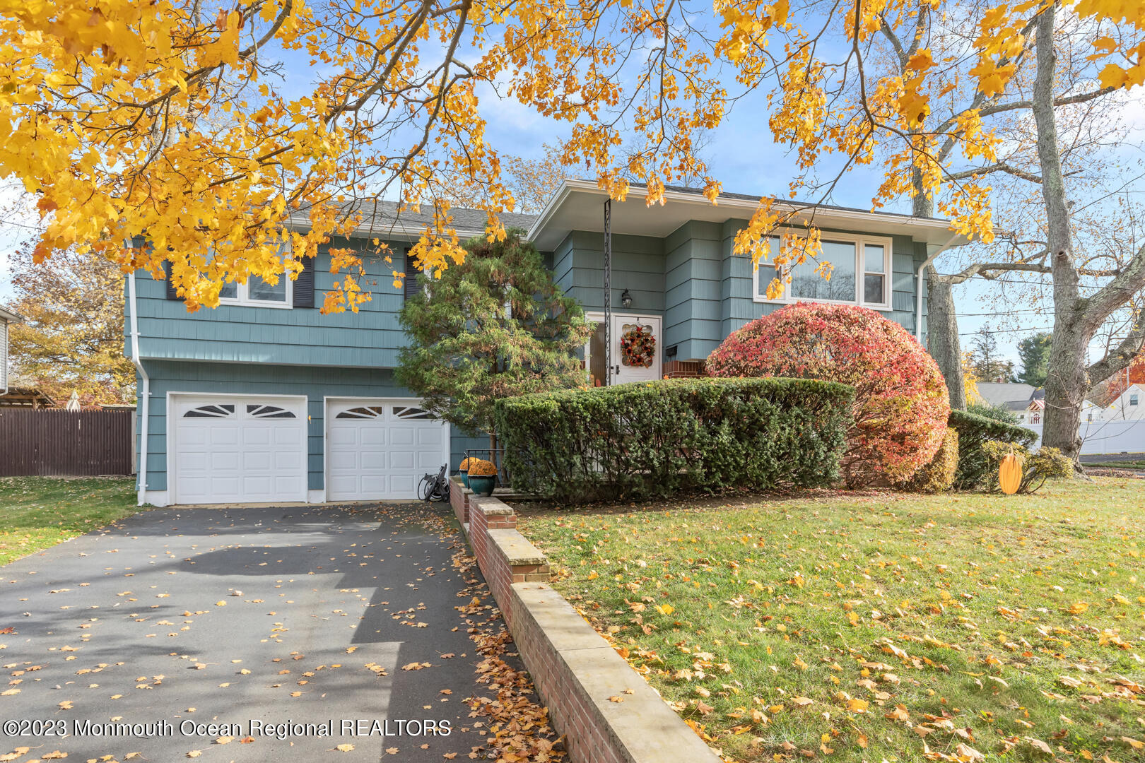 9 Schelly Drive Middletown, NJ 07748 - Photo 1 of 25 a front view of a house with garden
