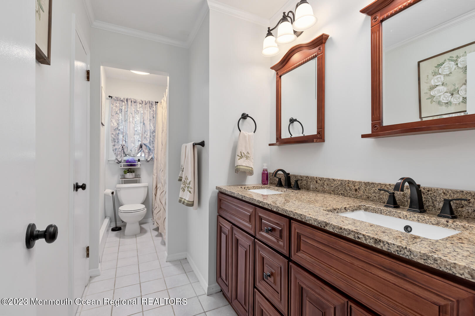 9 Schelly Drive Middletown, NJ 07748 - Photo 13 of 25 a bathroom with a granite countertop sink and a mirror