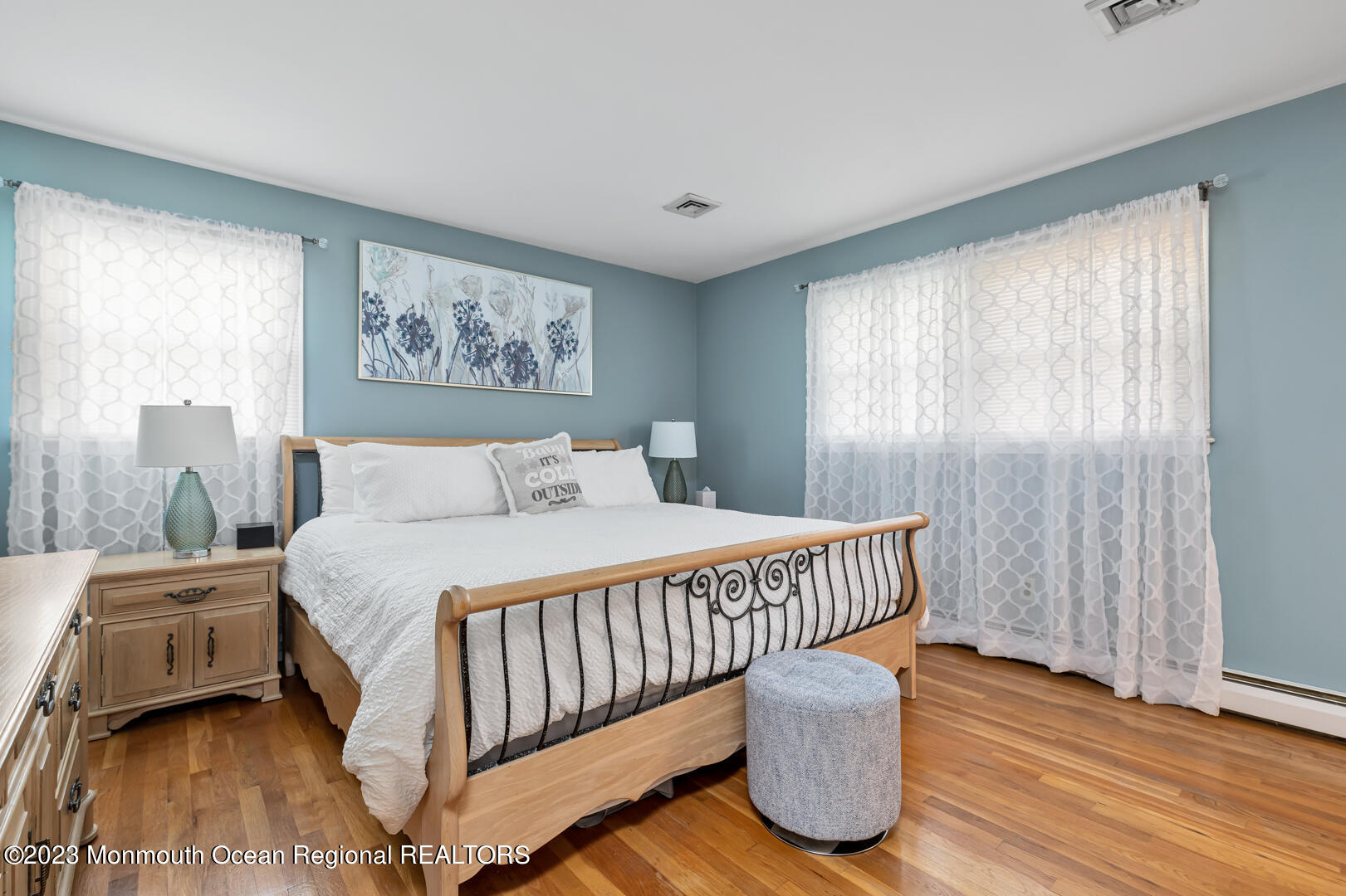 9 Schelly Drive Middletown, NJ 07748 - Photo 14 of 25 a bedroom with a bed and wooden floor