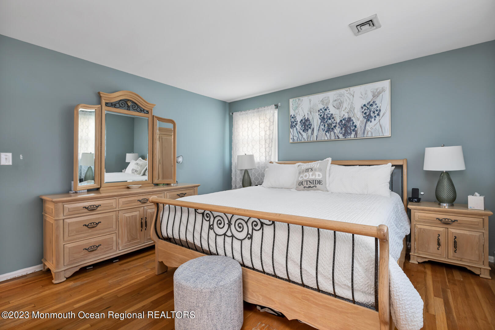 9 Schelly Drive Middletown, NJ 07748 - Photo 15 of 25 a bedroom with a bed and a chandelier