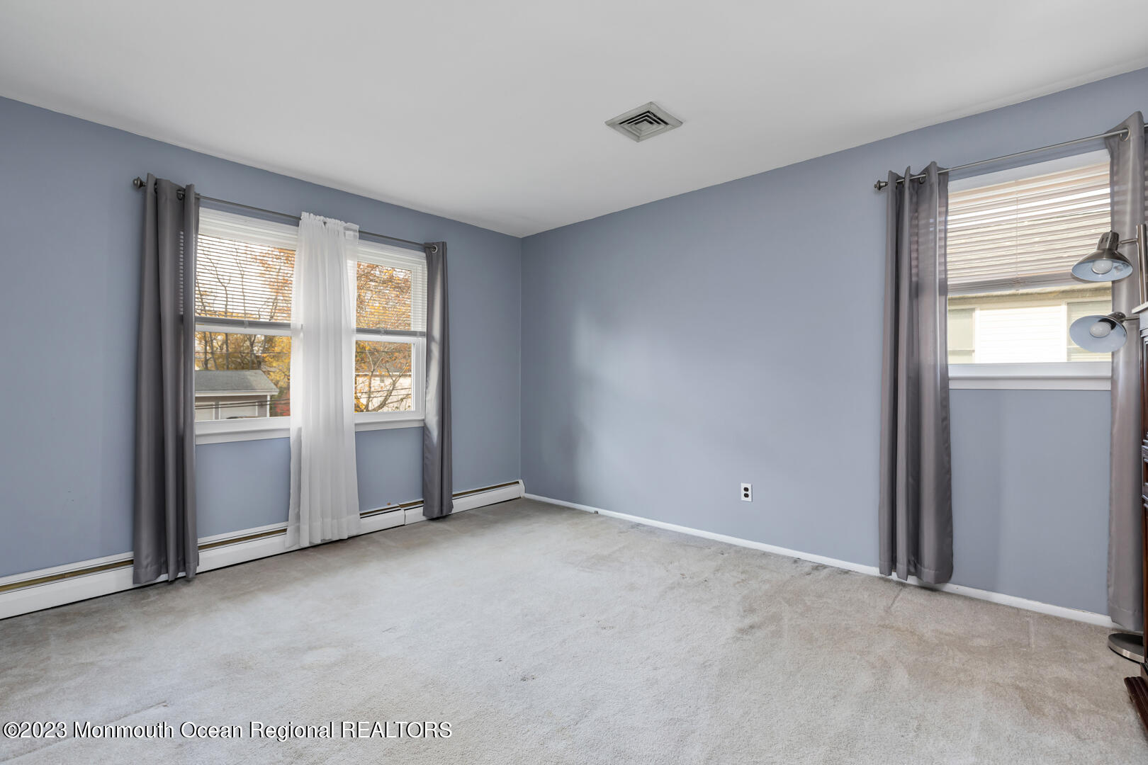 9 Schelly Drive Middletown, NJ 07748 - Photo 17 of 25 an empty room with windows