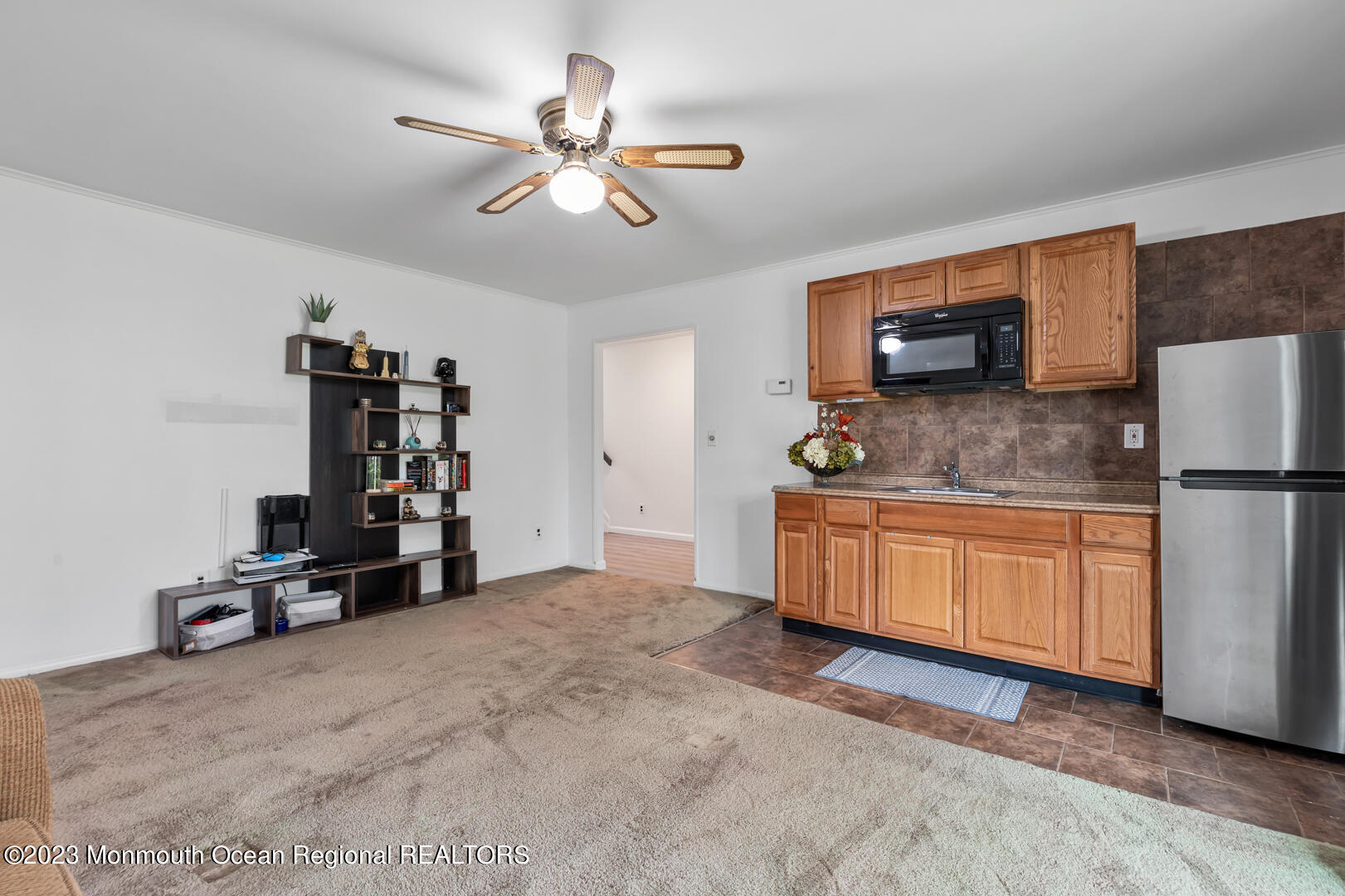 9 Schelly Drive Middletown, NJ 07748 - Photo 22 of 25 a living room with furniture and a flat screen tv