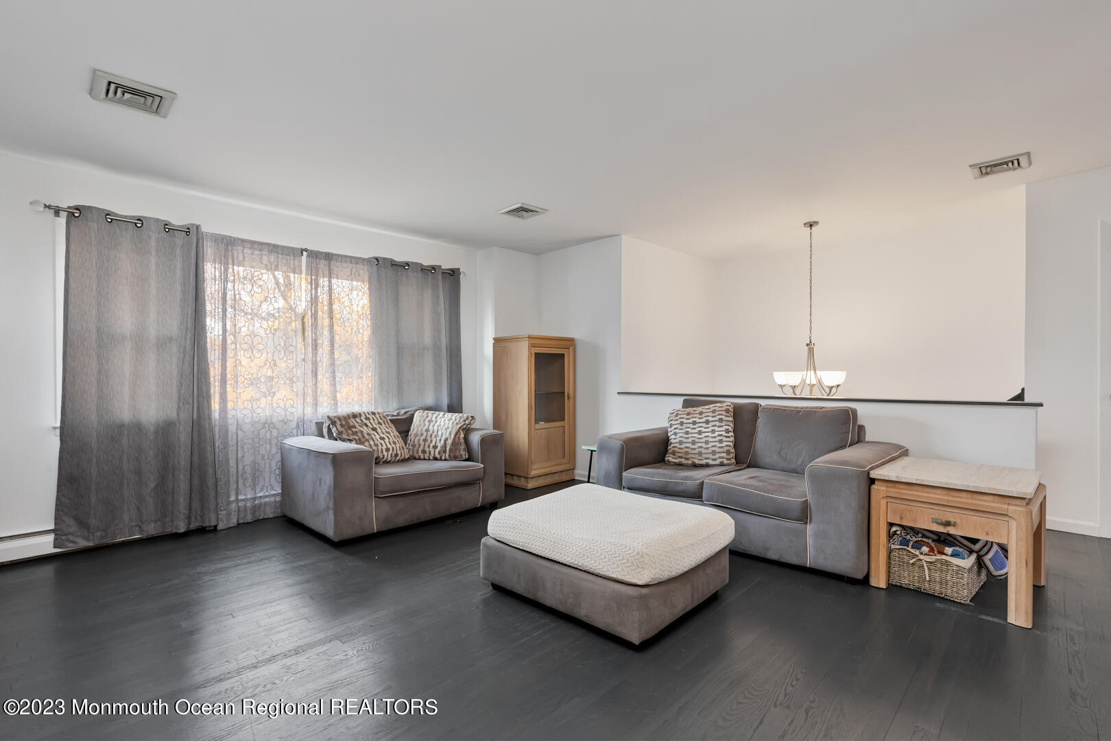 9 Schelly Drive Middletown, NJ 07748 - Photo 5 of 25 a living room with furniture and a window