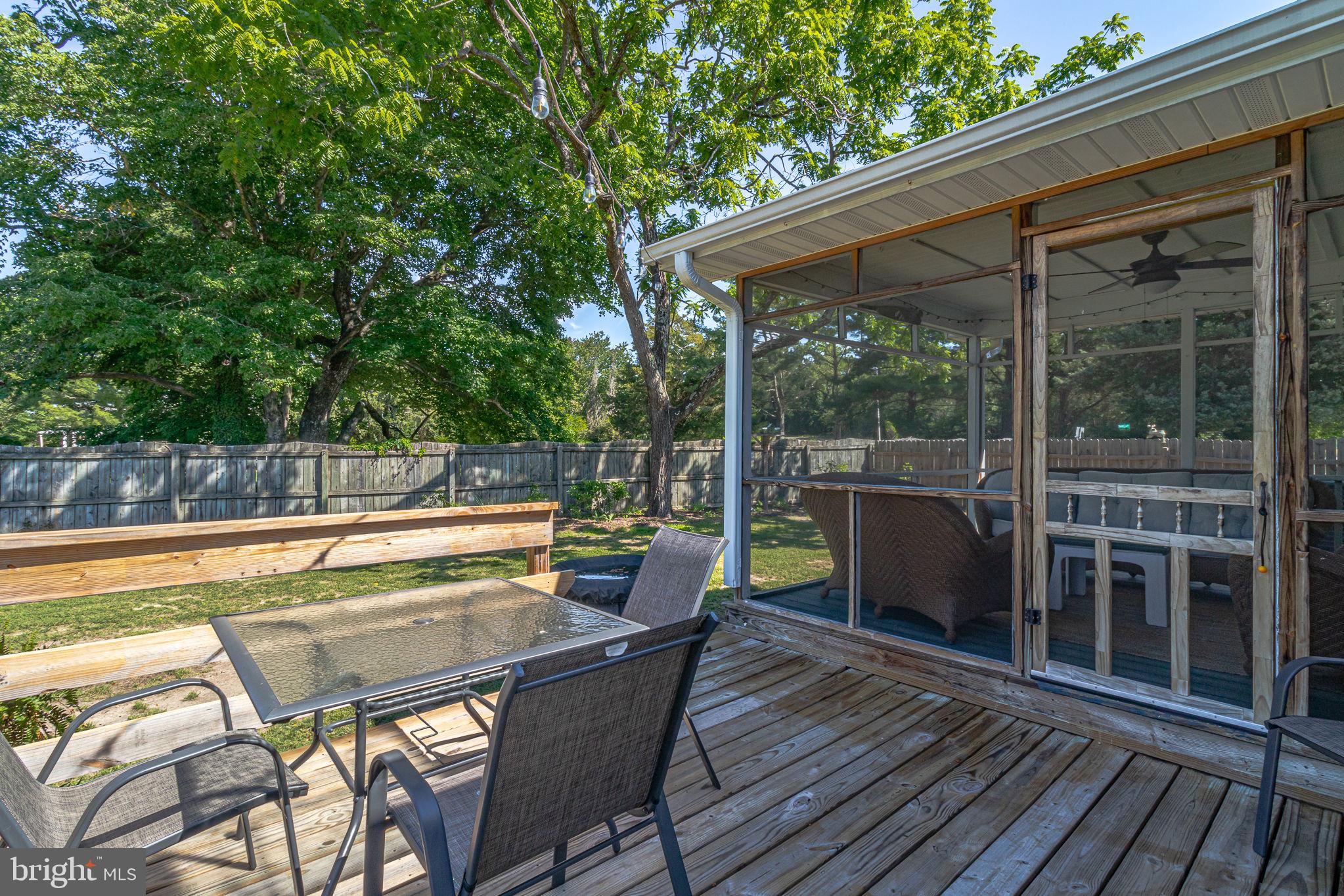 9832 River Road Lancaster, VA 22503 - Photo 53 of 68 Serene outdoor retreat with lush greenery.