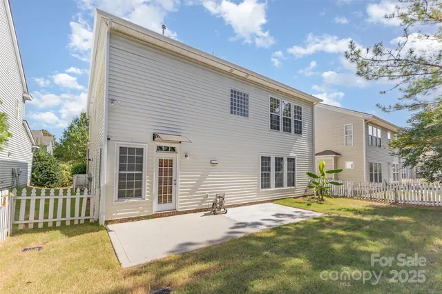 a view of swimming pool with trees in the background