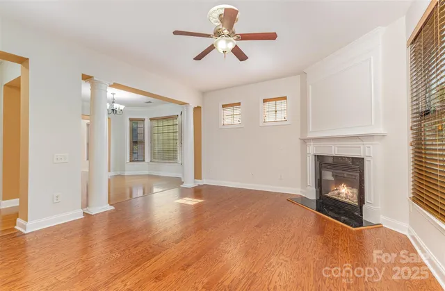 a view of a room window and fireplace