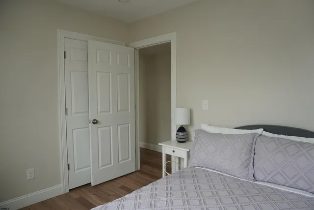 a view of a livingroom with furniture and natural light