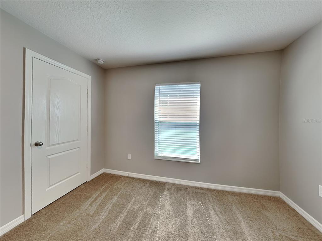 Undisclosed Address Lakeland, FL 33811 - Photo 14 of 17 an empty room with a window