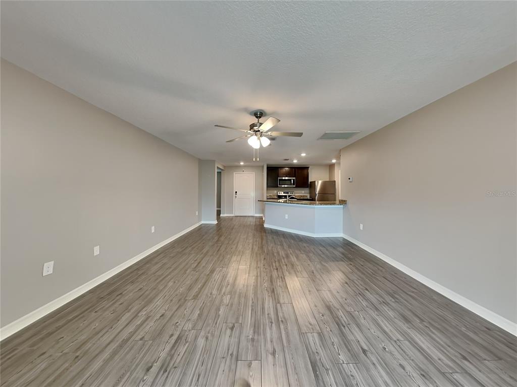 Undisclosed Address Lakeland, FL 33811 - Photo 2 of 17 a view of a kitchen with a sink and a stove top oven