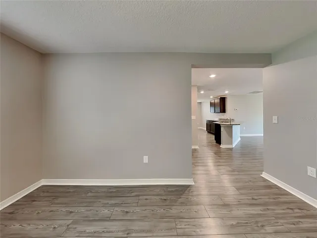 a view of kitchen with a sink and a kitchen space