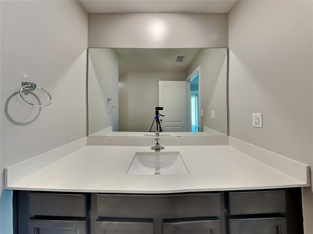 Undisclosed Address Lakeland, FL 33811 - Photo 10 of 17 a view of a room with a table and chairs