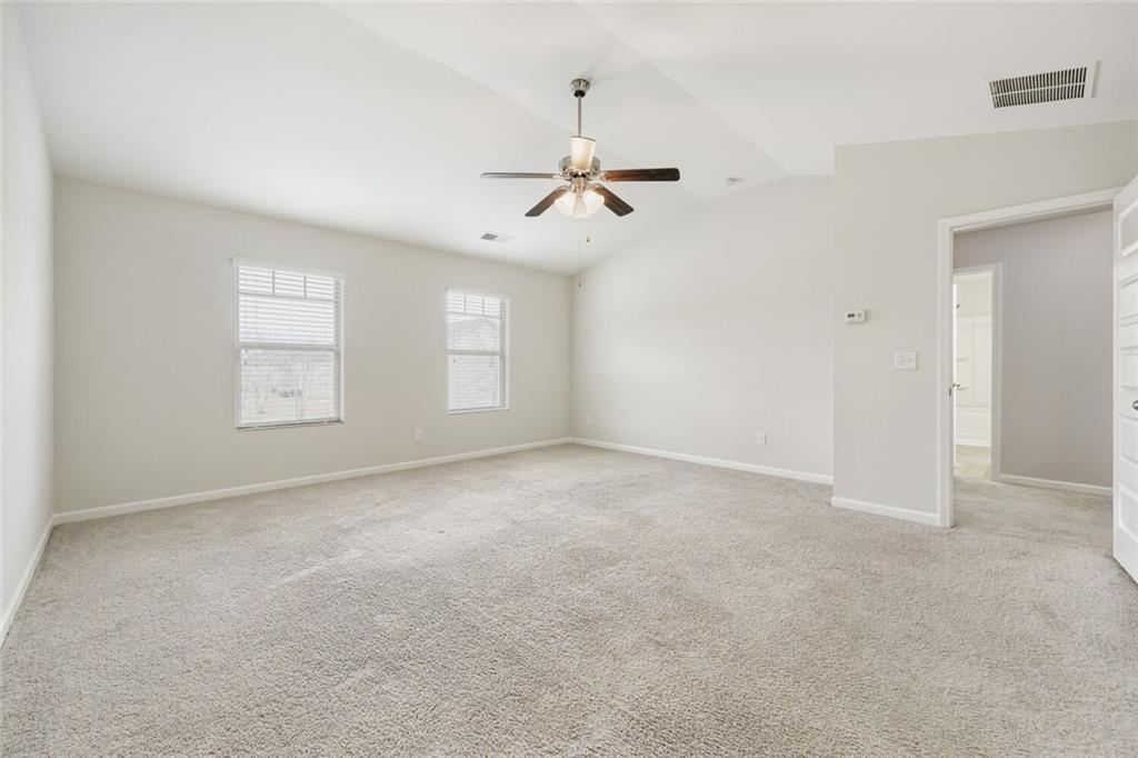 323 Bandelier Circle Hampton, GA 30228 - Photo 15 of 28 a view of an empty room with a window
