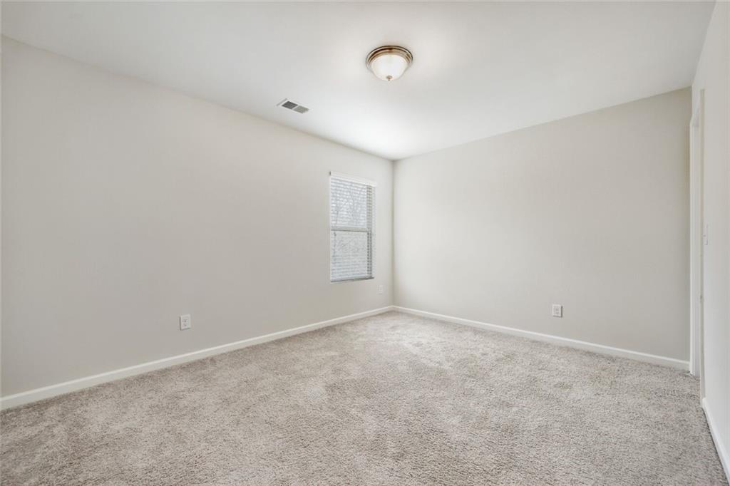 323 Bandelier Circle Hampton, GA 30228 - Photo 19 of 28 a view of an empty room