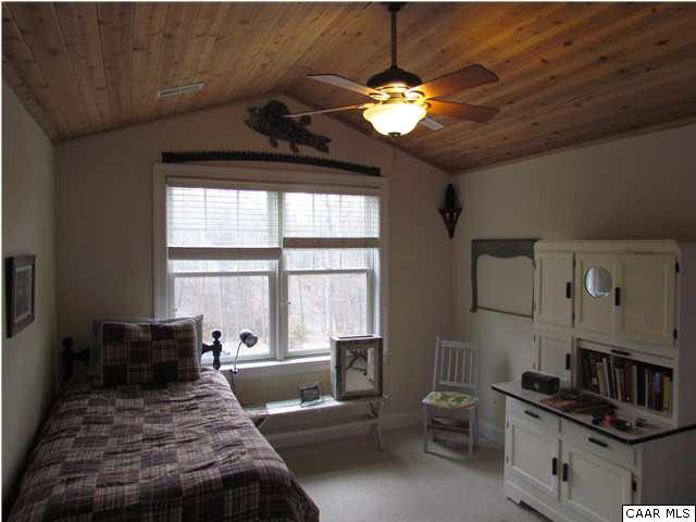 345 Burchs Creek Road Crozet, VA 22932 - Photo 23 of 35 Bedroom with natural tough & groove, vaulted pine ceilings.
