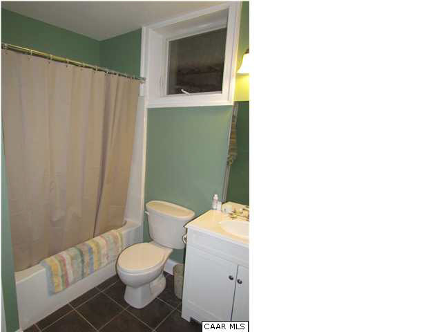 345 Burchs Creek Road Crozet, VA 22932 - Photo 29 of 35 Basement full bath with slate tile flooring.