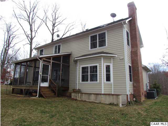 345 Burchs Creek Road Crozet, VA 22932 - Photo 4 of 35 Rear elevation. Masonry chimney, living room bay window & screen porch off the kitchen.