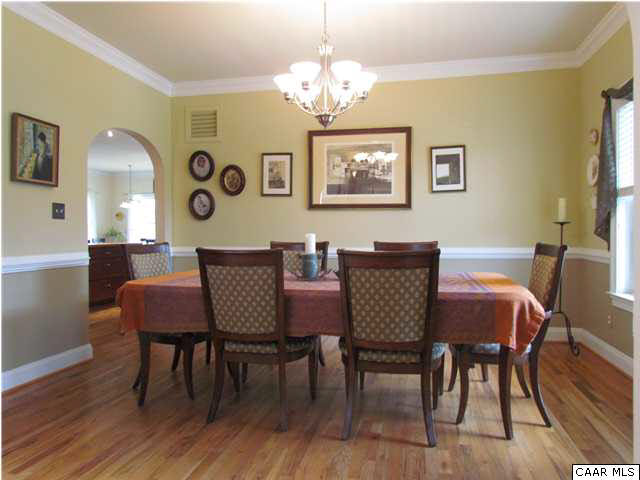 345 Burchs Creek Road Crozet, VA 22932 - Photo 10 of 35 Dining room with lovely crown molding and chair rail on the right as you enter the foyer.