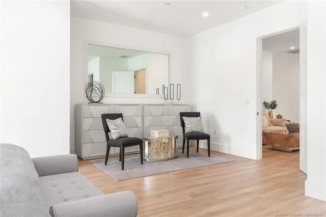 a workspace with furniture and a window