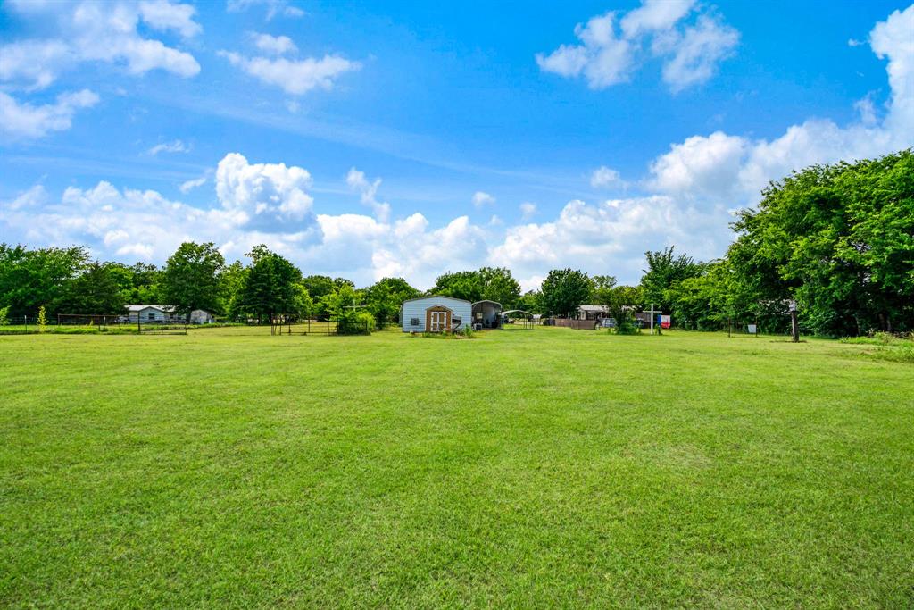 735 1st Southwest Detroit, TX 75436 - Photo 19 of 26 a view of yard with green space