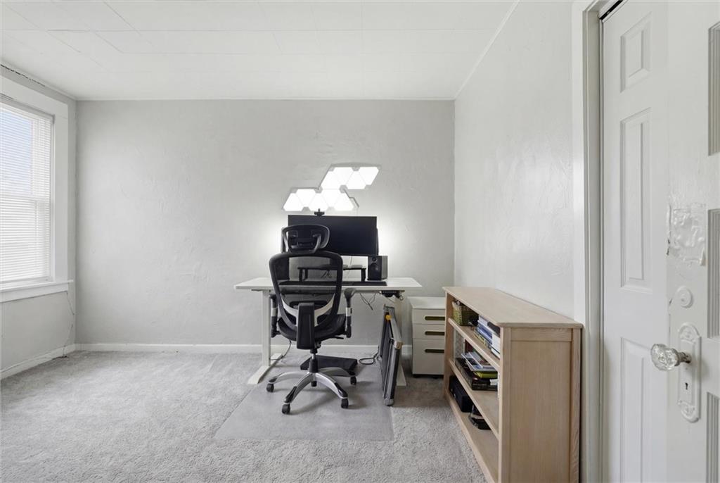 633 Gettysburg Street Pittsburgh, PA 15206 - Photo 21 of 32 a view of a workspace with furniture and a window