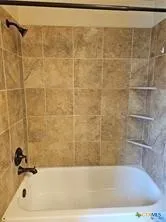 a bathroom with a bathtub