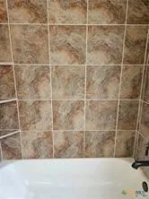 a bathroom with a bathtub