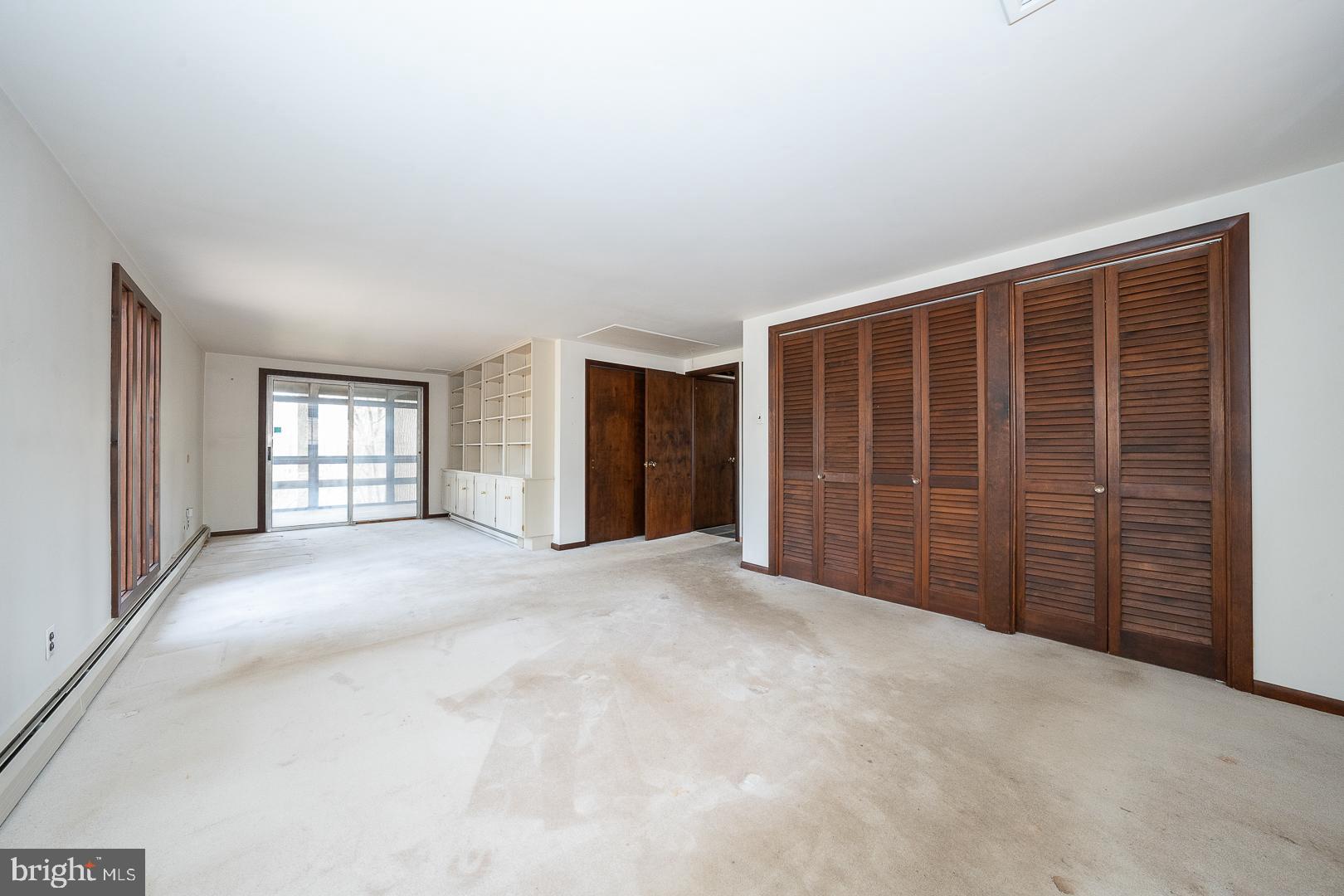 759 Hedges Lane Wayne, PA 19087 - Photo 24 of 60 Egress to screened in porch off primary bedroom
