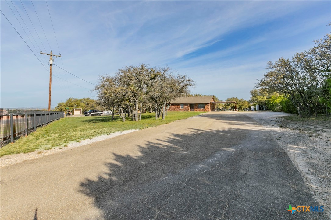 1001 Cherokee Trail Kempner, TX 76522 - Photo 14 of 18 a view of a street with a yard