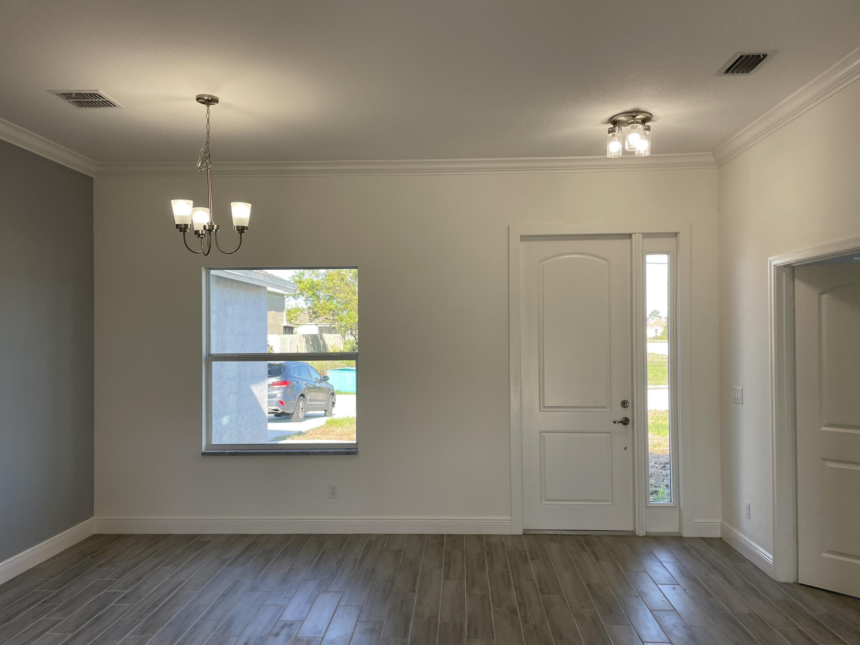 151 Southwest Becker Road Port St. Lucie, FL 34953 - Photo 2 of 14 Sunrise Model Main Entrance Interior