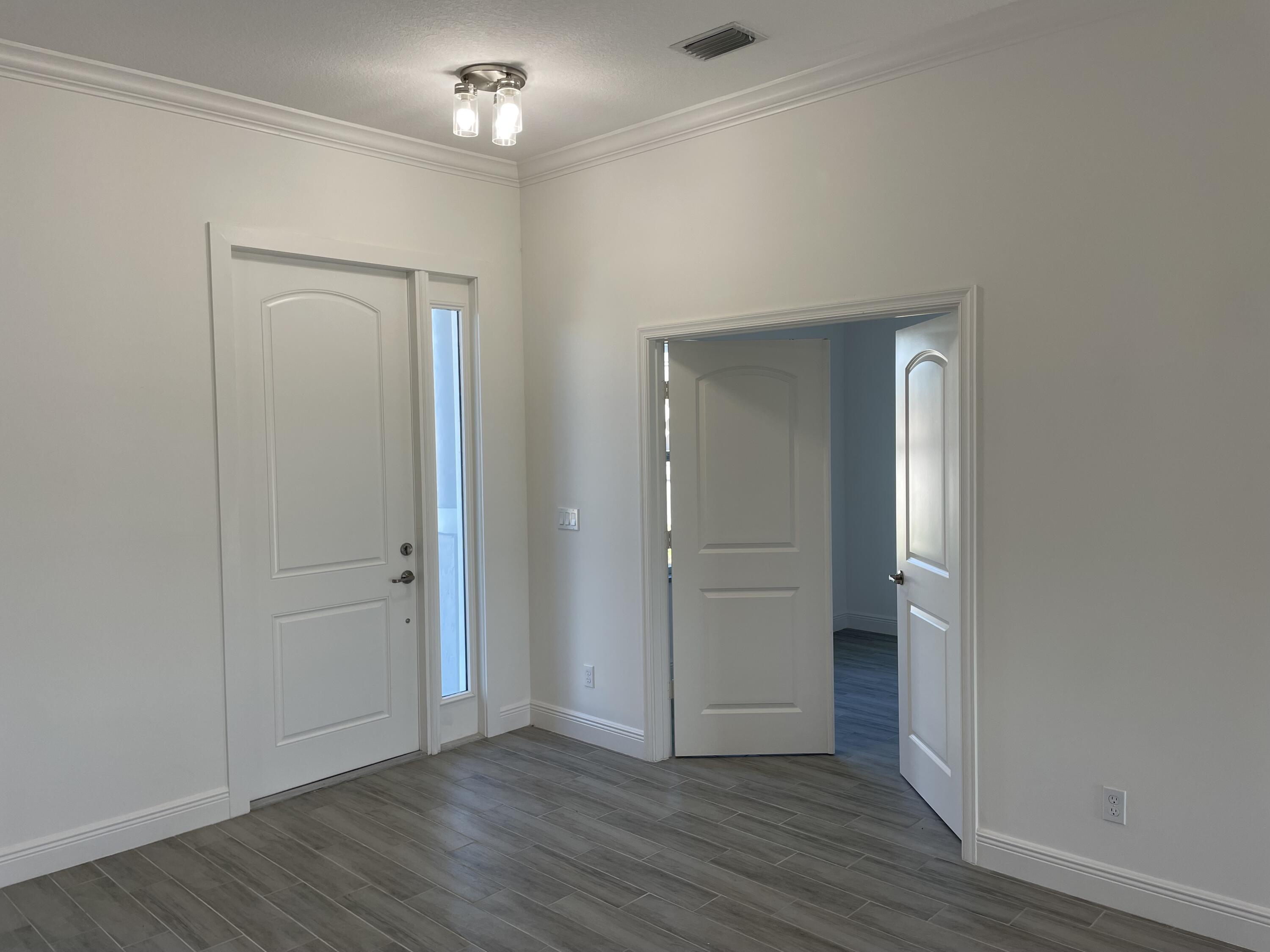 151 Southwest Becker Road Port St. Lucie, FL 34953 - Photo 3 of 14 Sunrise Model Den