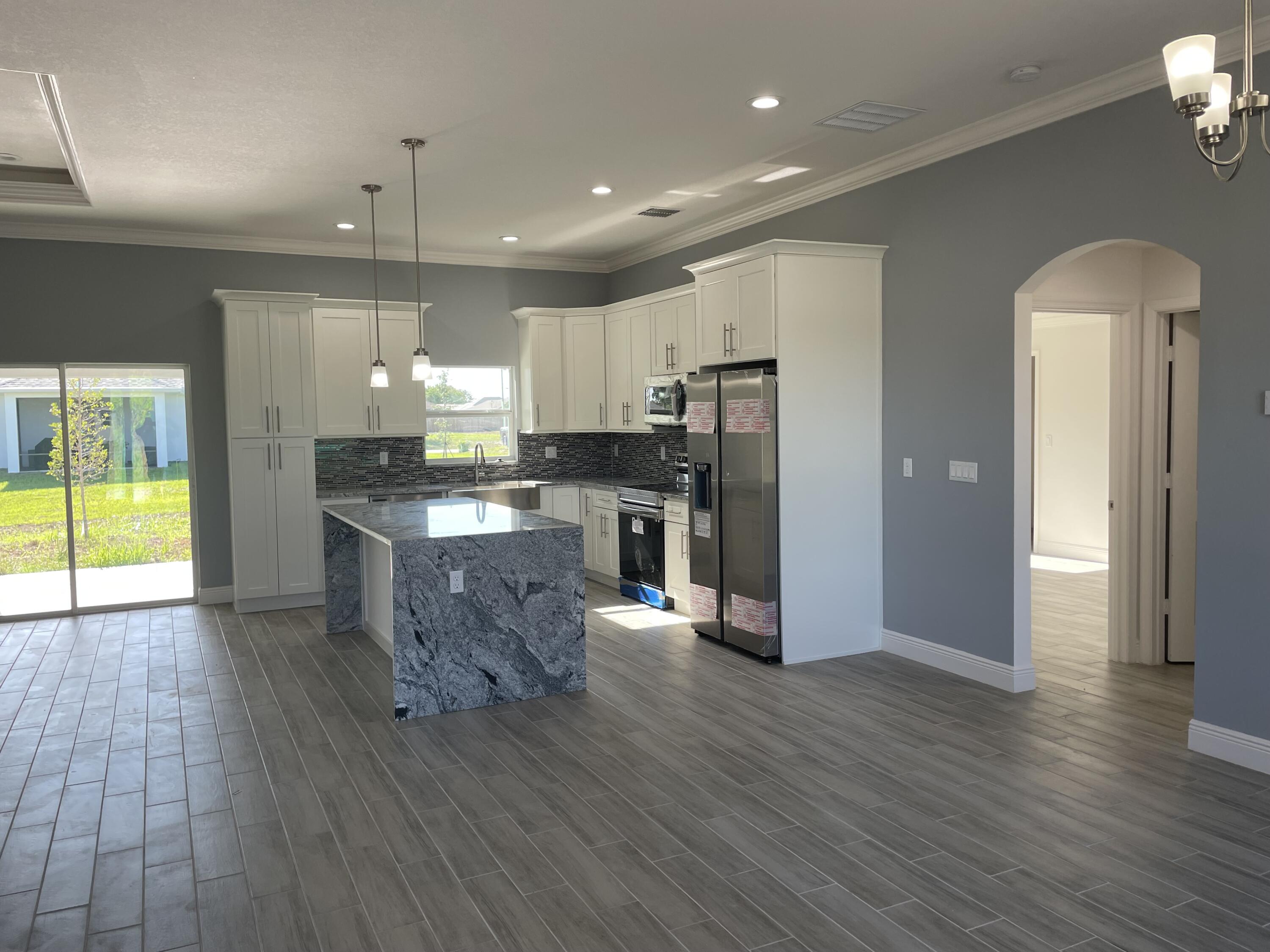 151 Southwest Becker Road Port St. Lucie, FL 34953 - Photo 5 of 14 Sunrise Model Kitchen