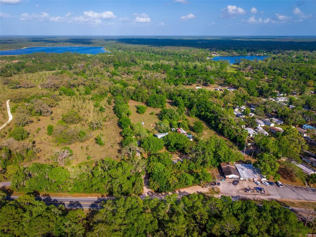 Fishermans Road Paisley, FL 32767 - Photo 16 of 77 a view of a yard with an outdoor space