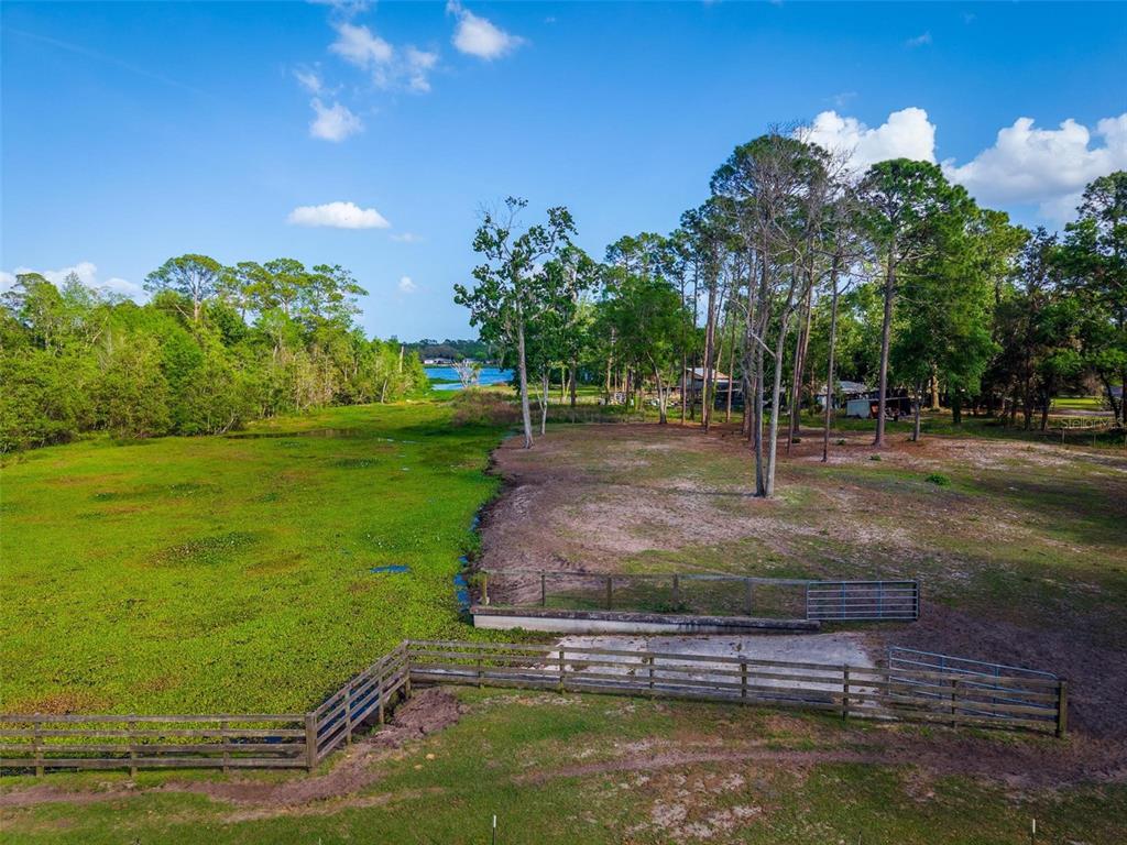 Fishermans Road Paisley, FL 32767 - Photo 24 of 77 a view of a garden with an outdoor space