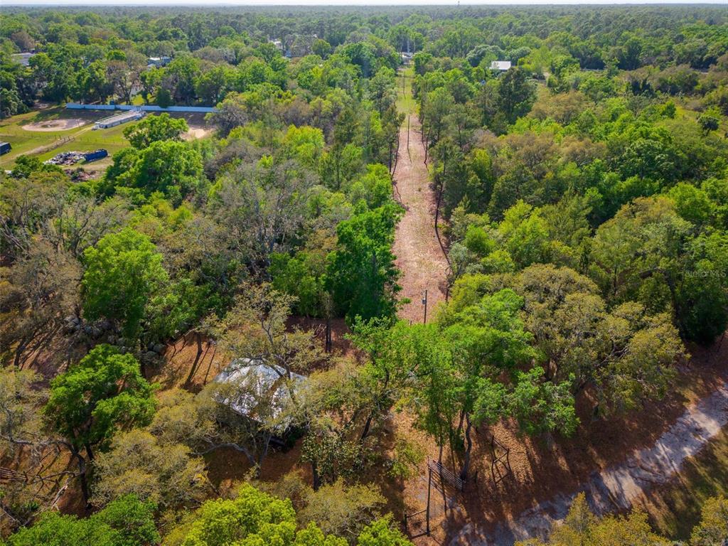 Fishermans Road Paisley, FL 32767 - Photo 28 of 77 an aerial view of residential house with outdoor space and trees all around