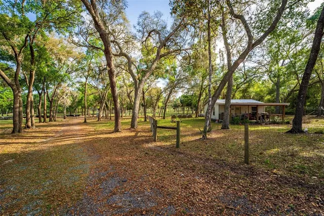 an outdoor view of a house having patio