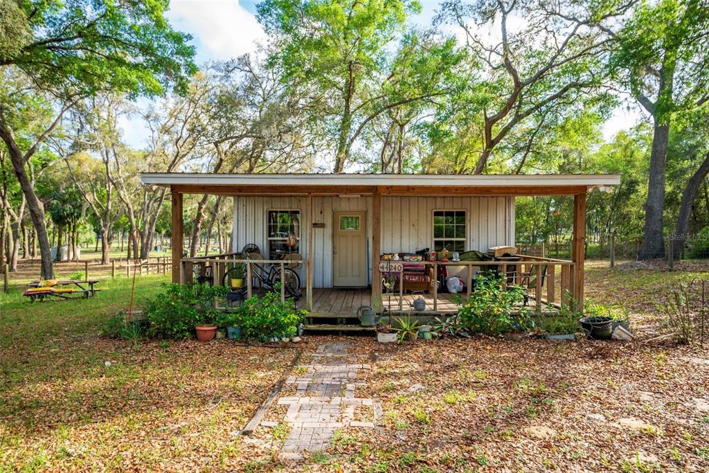 Fishermans Road Paisley, FL 32767 - Photo 36 of 77 a view of a house with backyard sitting area and garden