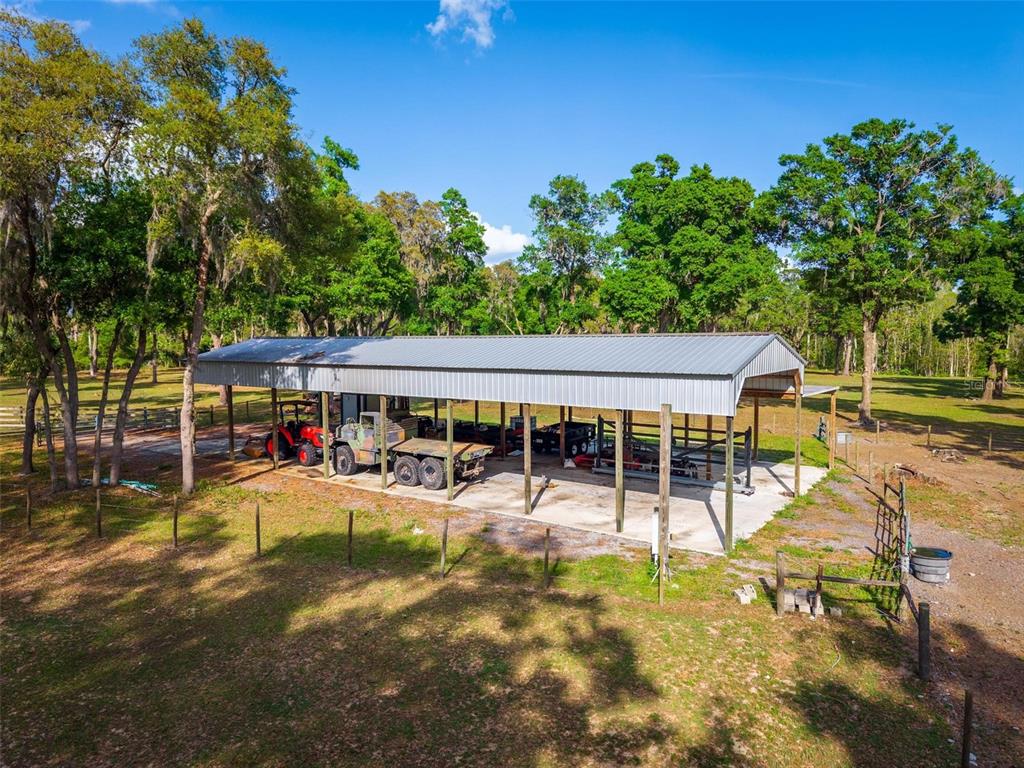 Fishermans Road Paisley, FL 32767 - Photo 49 of 77 an outdoor view of a house having patio