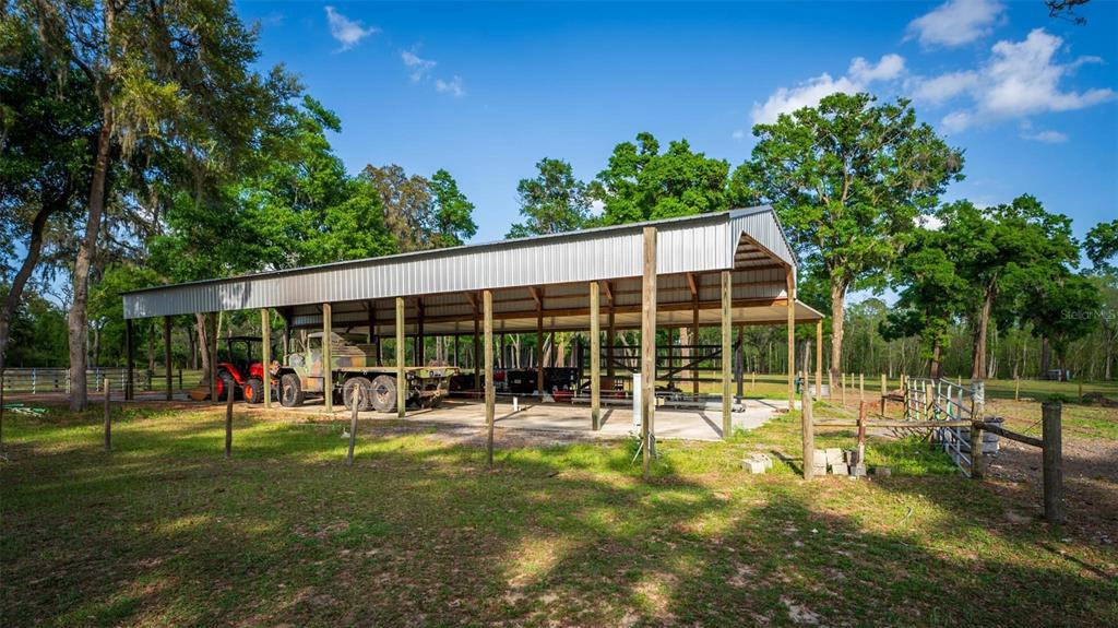Fishermans Road Paisley, FL 32767 - Photo 51 of 77 a view of a house with a backyard and porch