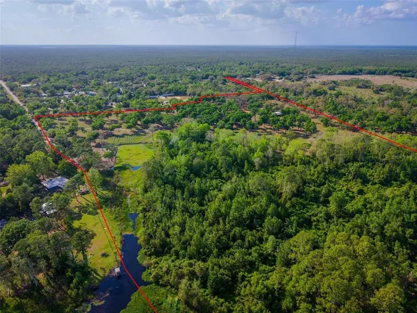 a view of a yard with an outdoor space