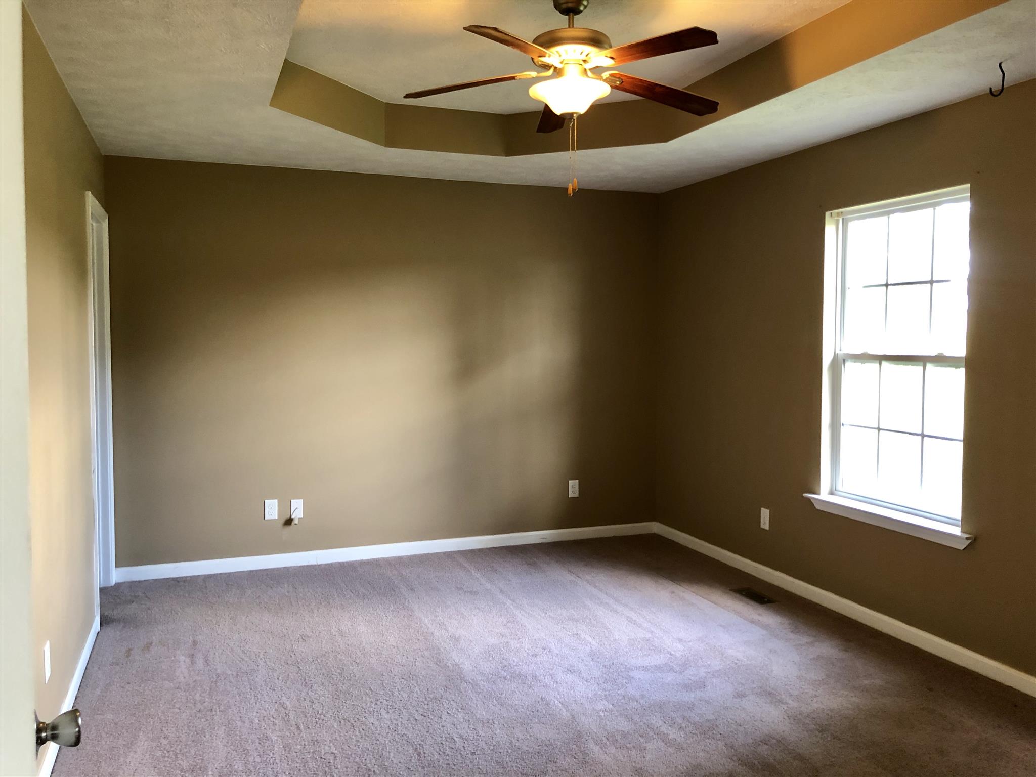 1427 Longview Road Unionville, TN 37180 - Photo 6 of 11 an empty room with a window