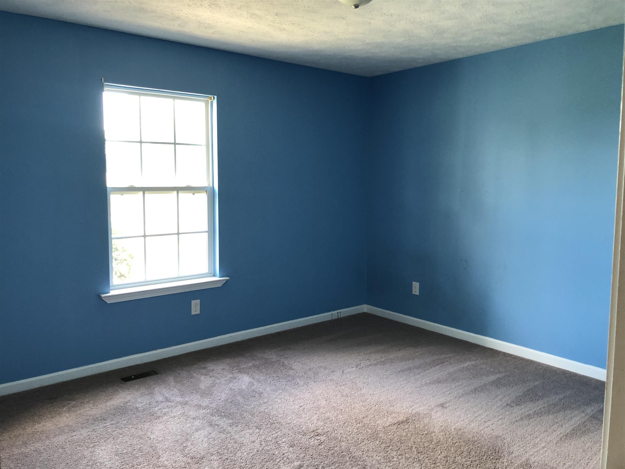 1427 Longview Road Unionville, TN 37180 - Photo 9 of 11 an empty room with a window