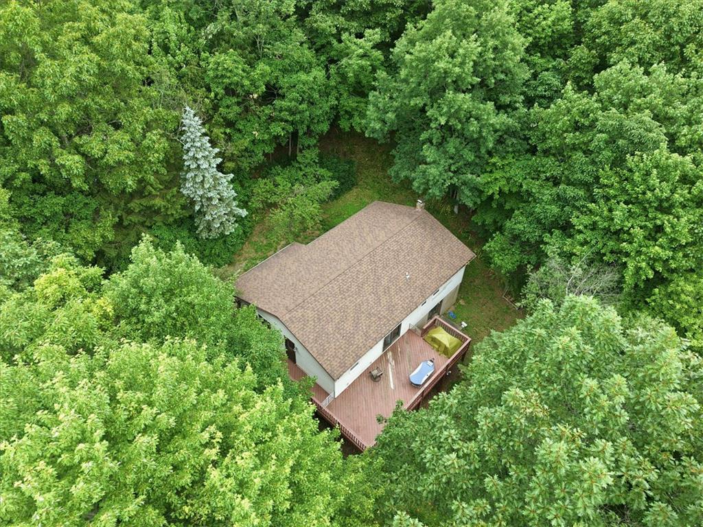 520 Highland Hill Road Jim Thorpe, PA 18235 - Photo 68 of 83 Nestled amidst verdant woodlands, this private residence offers a serene escape with an inviting outdoor deck.