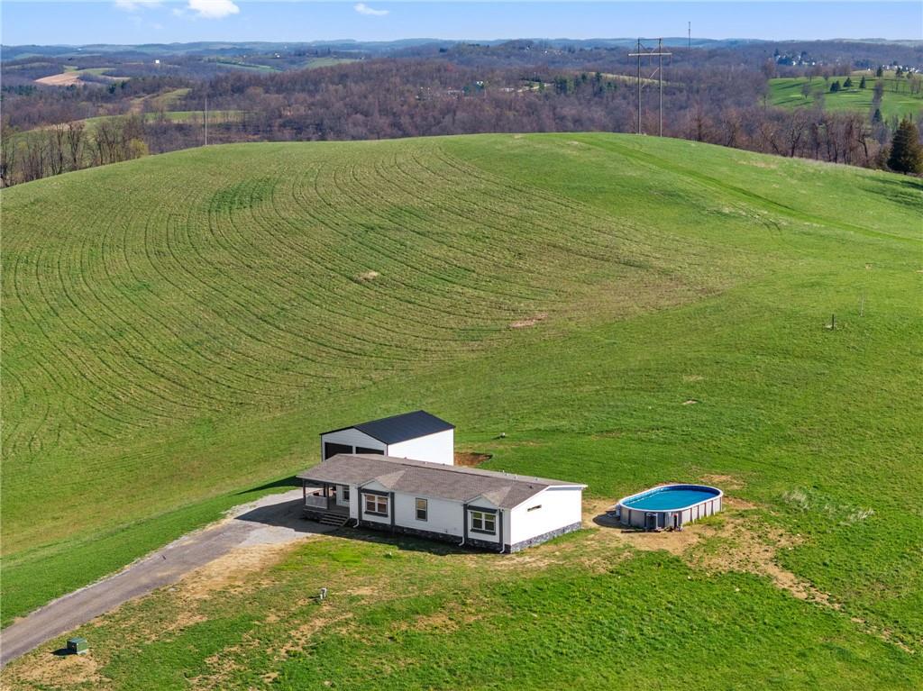 1350 Beham Ridge Road West Alexander, PA 15376 - Photo 42 of 48 a aerial view of a house with a garden